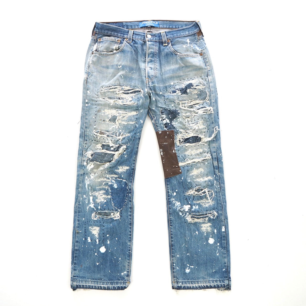 INNOCENCE LEATHER PATCH DENIM PANTS