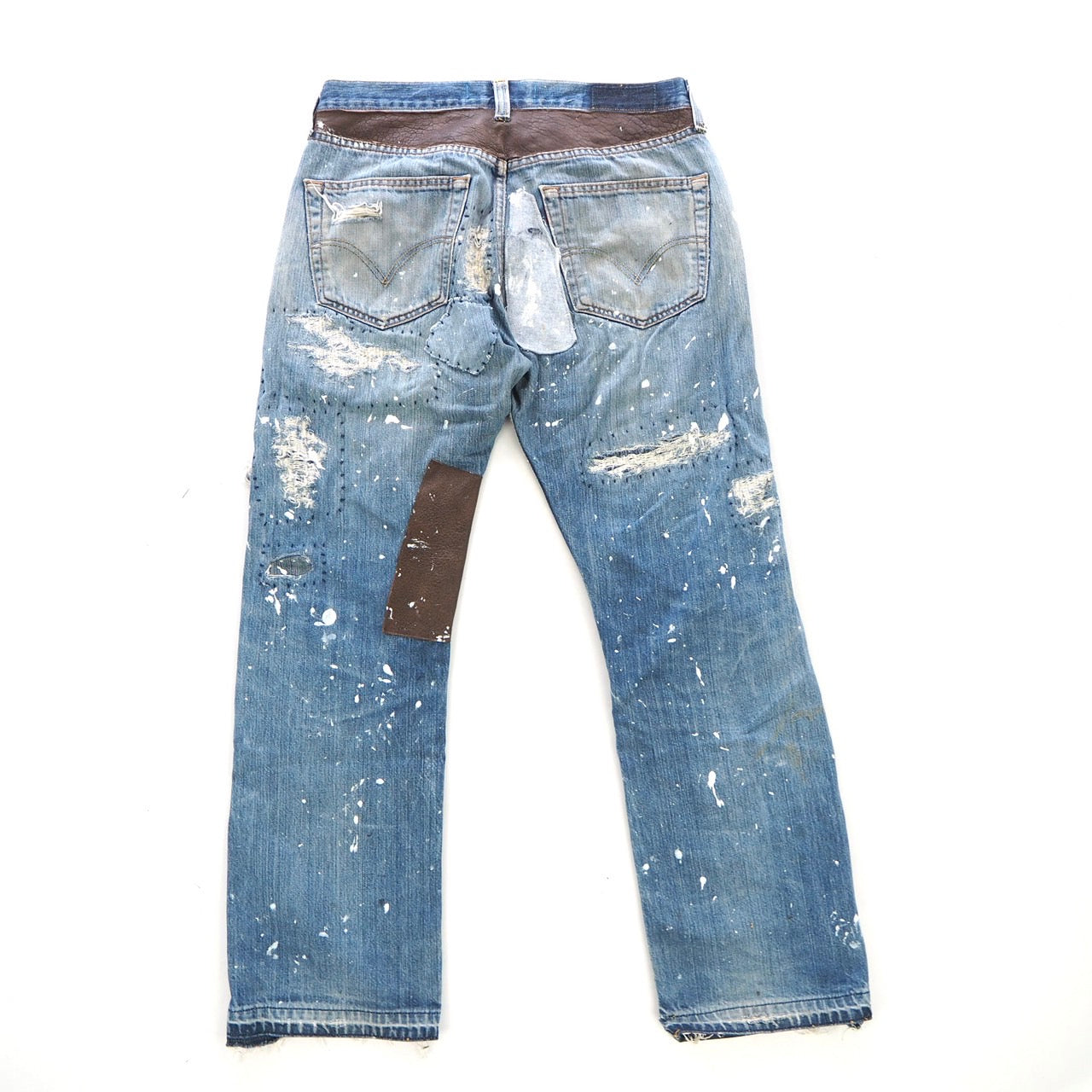 INNOCENCE LEATHER PATCH DENIM PANTS