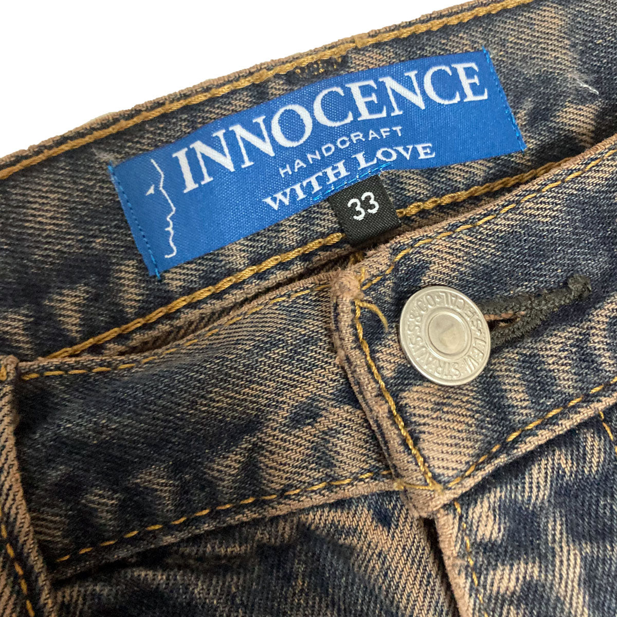 INNOCENCE OVER DESTROY DENIM PANTS